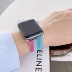 Four-colors Milanese replacement strap for Apple Watch Series 7 on wrist, stylish and comfortable design.