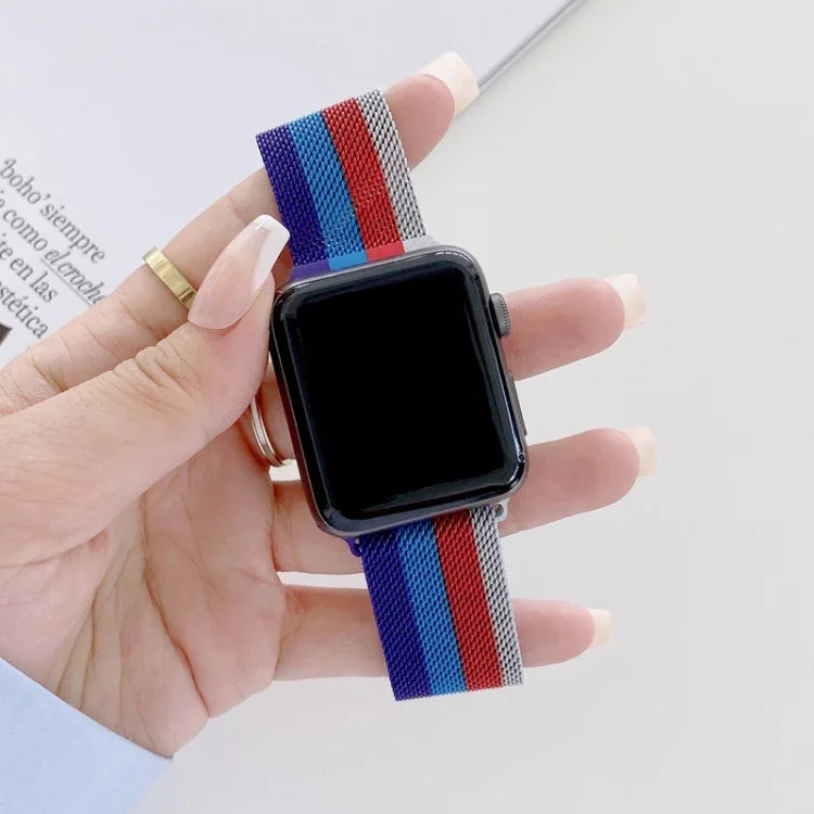 Milanese replacement strap for Apple Watch displayed on a hand, featuring a stylish four-color design.