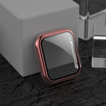 Apple Watch electroplated case in rose gold finish, showcasing integrated protective cover on a dark surface.