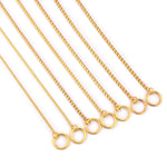 Metal dog collar showcases durable and stylish gold snake chain design with safe and secure attachment rings.
